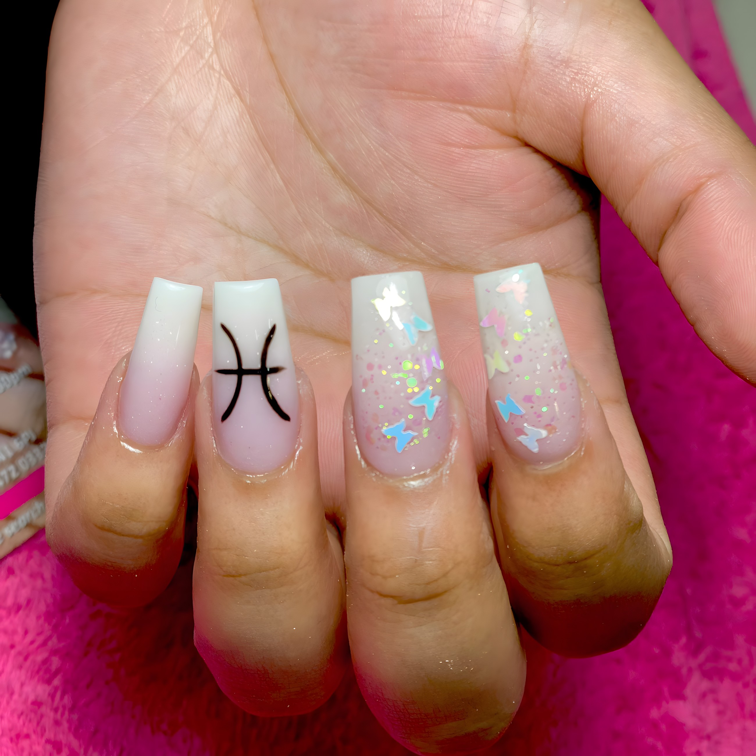 Pastel ombré nails with glitter accents